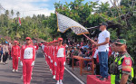 Camat Busungbiu I Ketut Suastika,S.Sos membuka dan melepas Lomba Gerak Jalan Tingkat SMP,SMA/SMKdan Umum Kecamatan Busungbiu